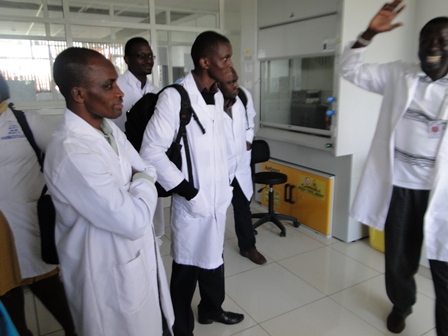 Photo: A researcher guides CEBIB postgraduates in African Reference Lab for Bee Health, ICIPE 